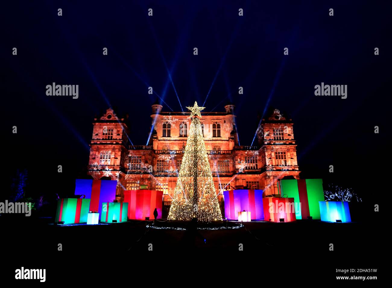 Wollaton Hall in Nottingham which has been transformed into an enchanted light experience to create Christmas at Wollaton Hall, a unique, socially distanced festive outdoor light installation. Stock Photo