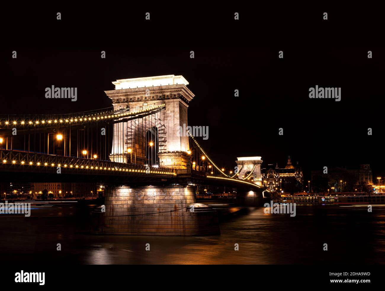 View of the Szechenyi Bridge at night in Budapest, Hungary Stock Photo