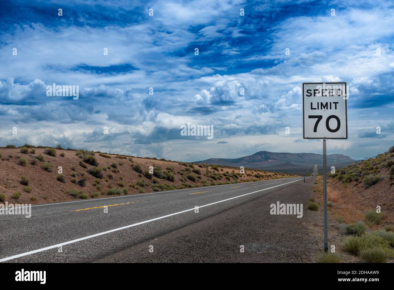 View of the US route 50 (known as the Loneliest Road in America) in the State of Nevada, USA. Concept for travel in America and road trip. Stock Photo