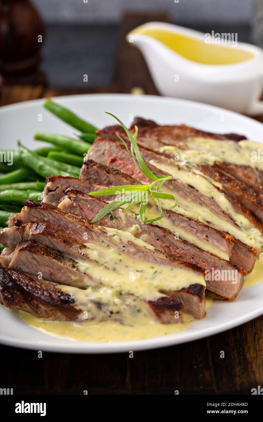 Steak with bearnaise sauce with tarragon Stock Photo Alamy