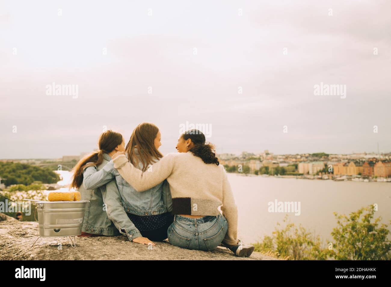 Female friends rear view hi-res stock photography and images - Alamy