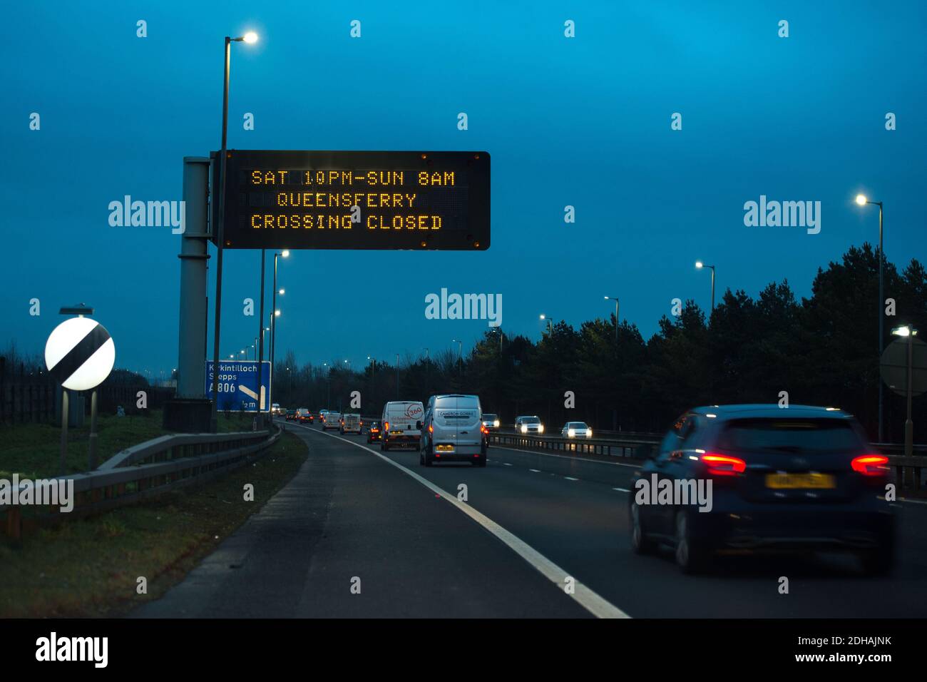 Glasgow, Scotland, UK. 10th Dec, 2020. Pictured: Motorway Road sign advising motorists not to travel over the Queensferry Crossing this weekend. Sign displays advisory warning, “SAT 10PM-SUN 8AM QUEENSFERRY CROSSING CLOSED” Credit: Colin Fisher/Alamy Live News Stock Photo
