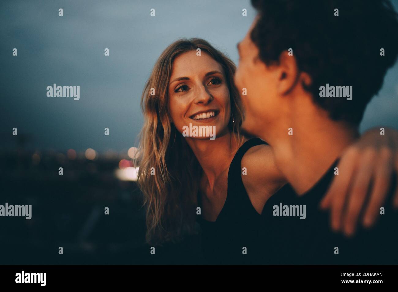 Woman arm around man hi-res stock photography and images - Alamy