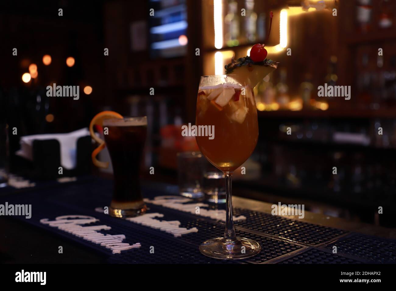 beer cocktail in martini glasses decorated with fruit for christmas party Stock Photo