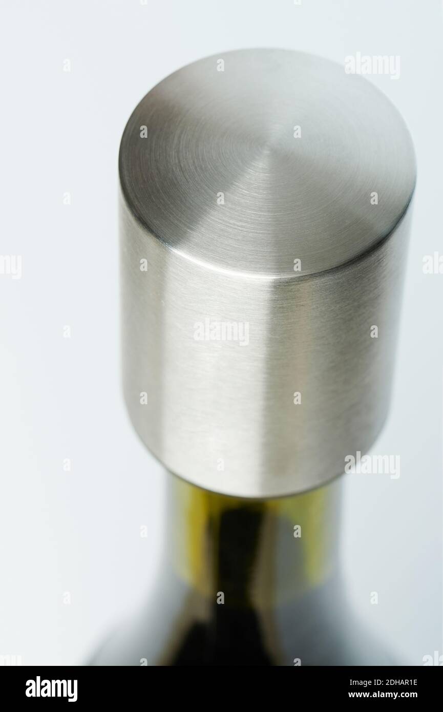 Temporary metal wine bottle stopper clsoe up isolated Stock Photo