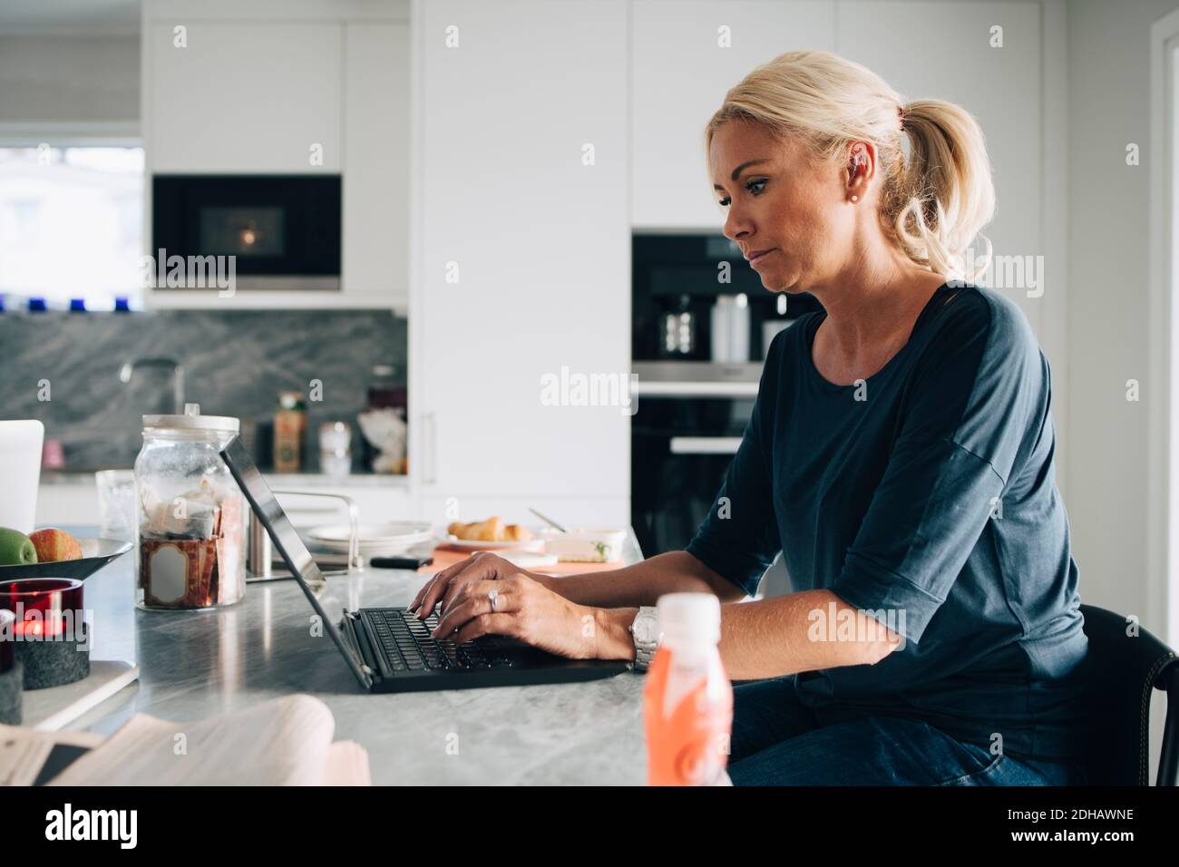 Mature blond woman hi-res stock photography and images - Alamy