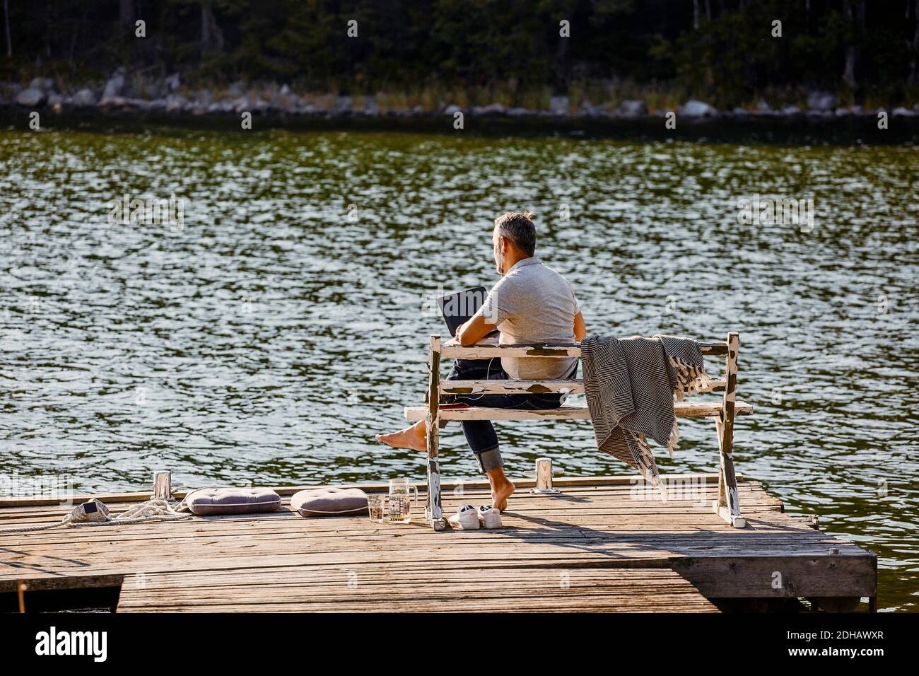 Wooden pier bench over hi-res stock photography and images - Alamy