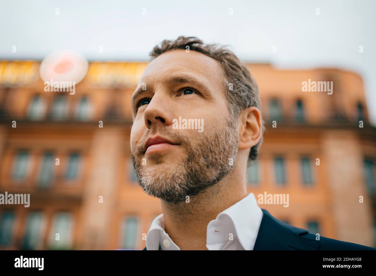 Close-up of thoughtful businessman looking away Stock Photo