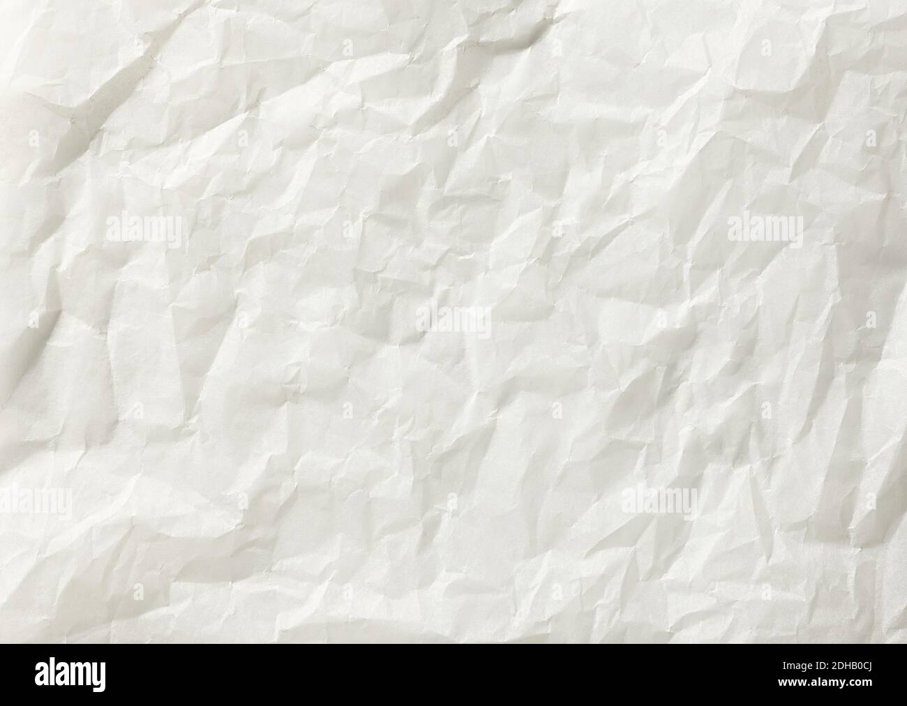crumpled white baking paper background, top view Stock Photo