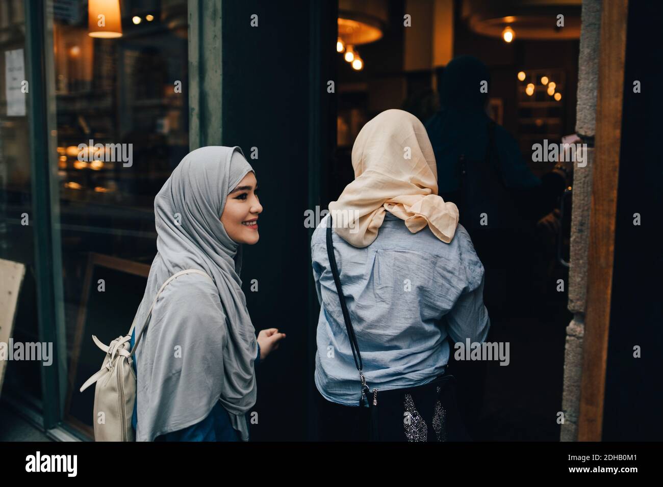 Rear view three women hi-res stock photography and images - Alamy