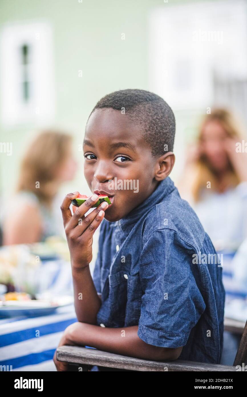 Boy eating dinner hi-res stock photography and images - Alamy