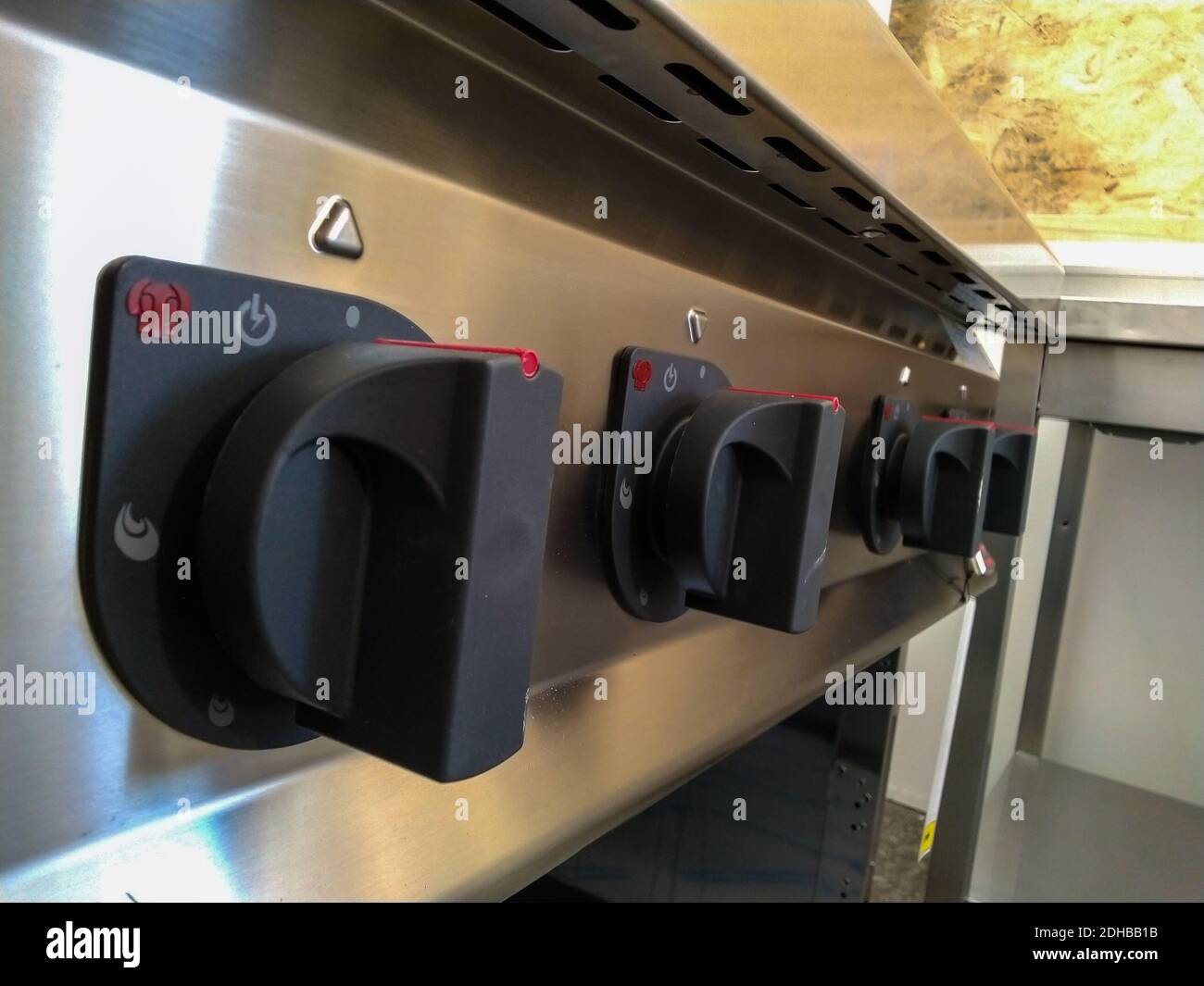 Commercial kitchen stove temperature controls Stock Photo Alamy