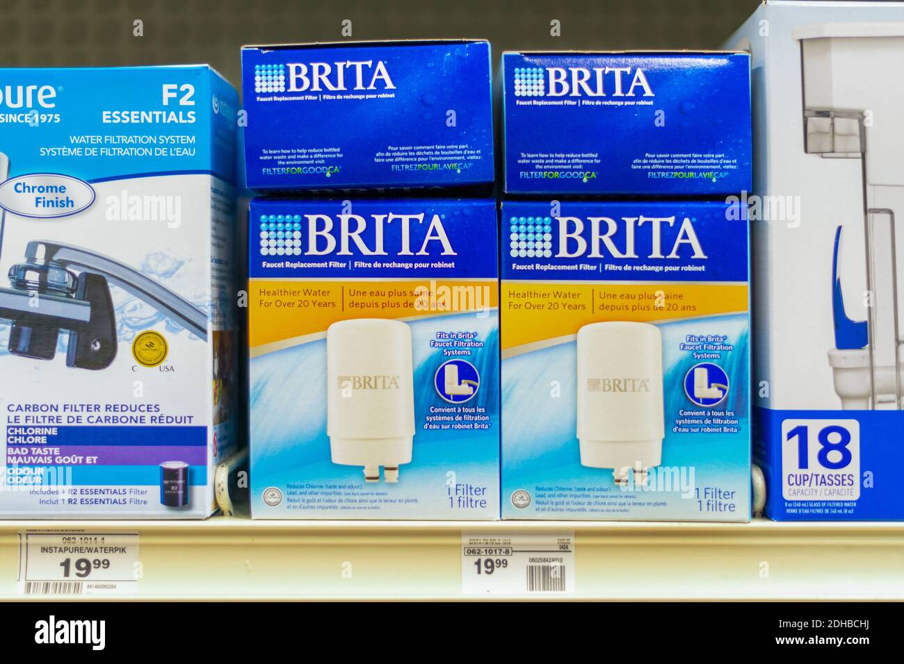 Brita water filter cases stacked on a shelf. Stock Photo