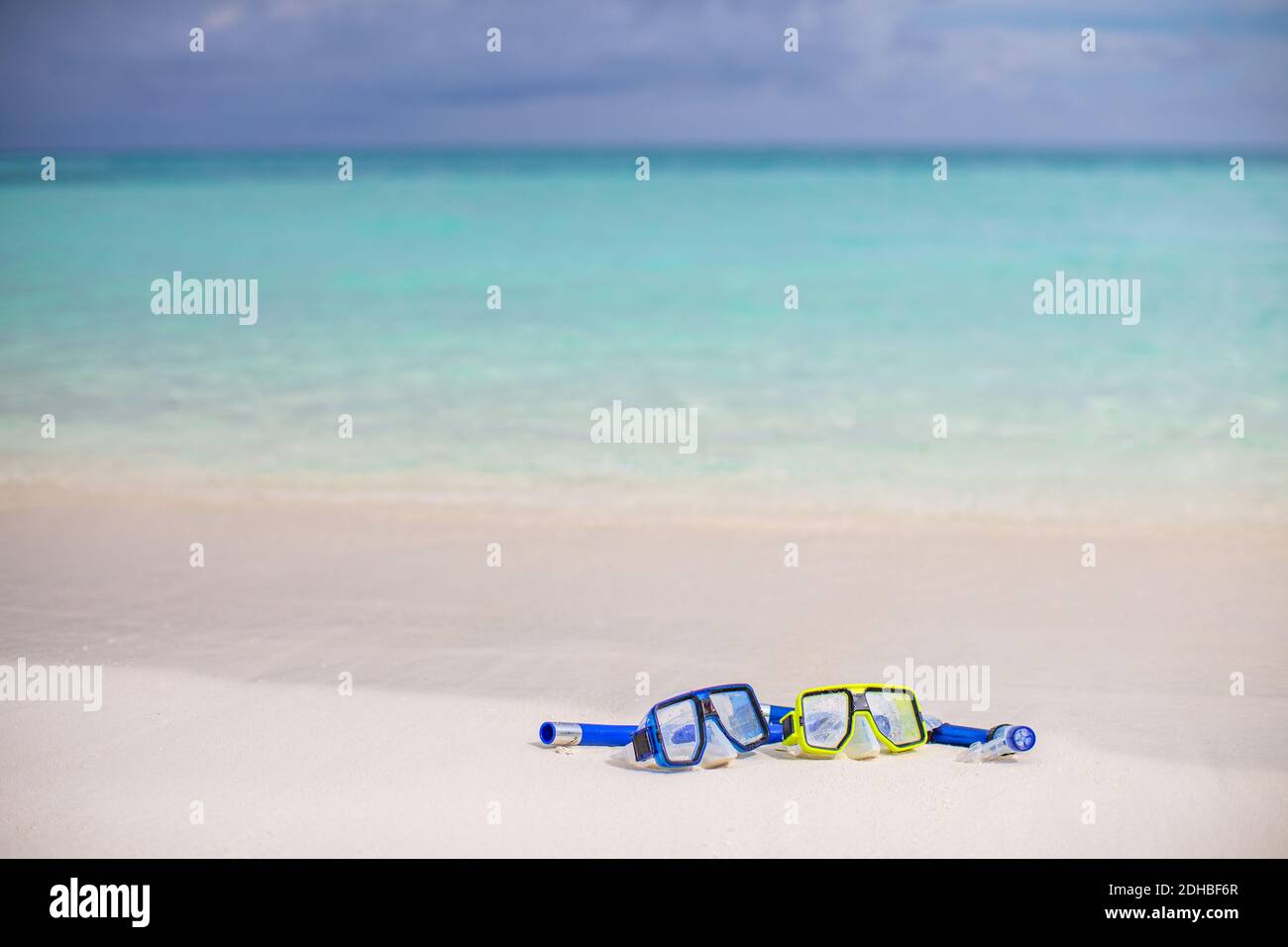 Snorkeling mask near surf, pair of snorkel scuba diving gear destination vacation travel tropical on the beach. Summer water sport, recreational Stock Photo