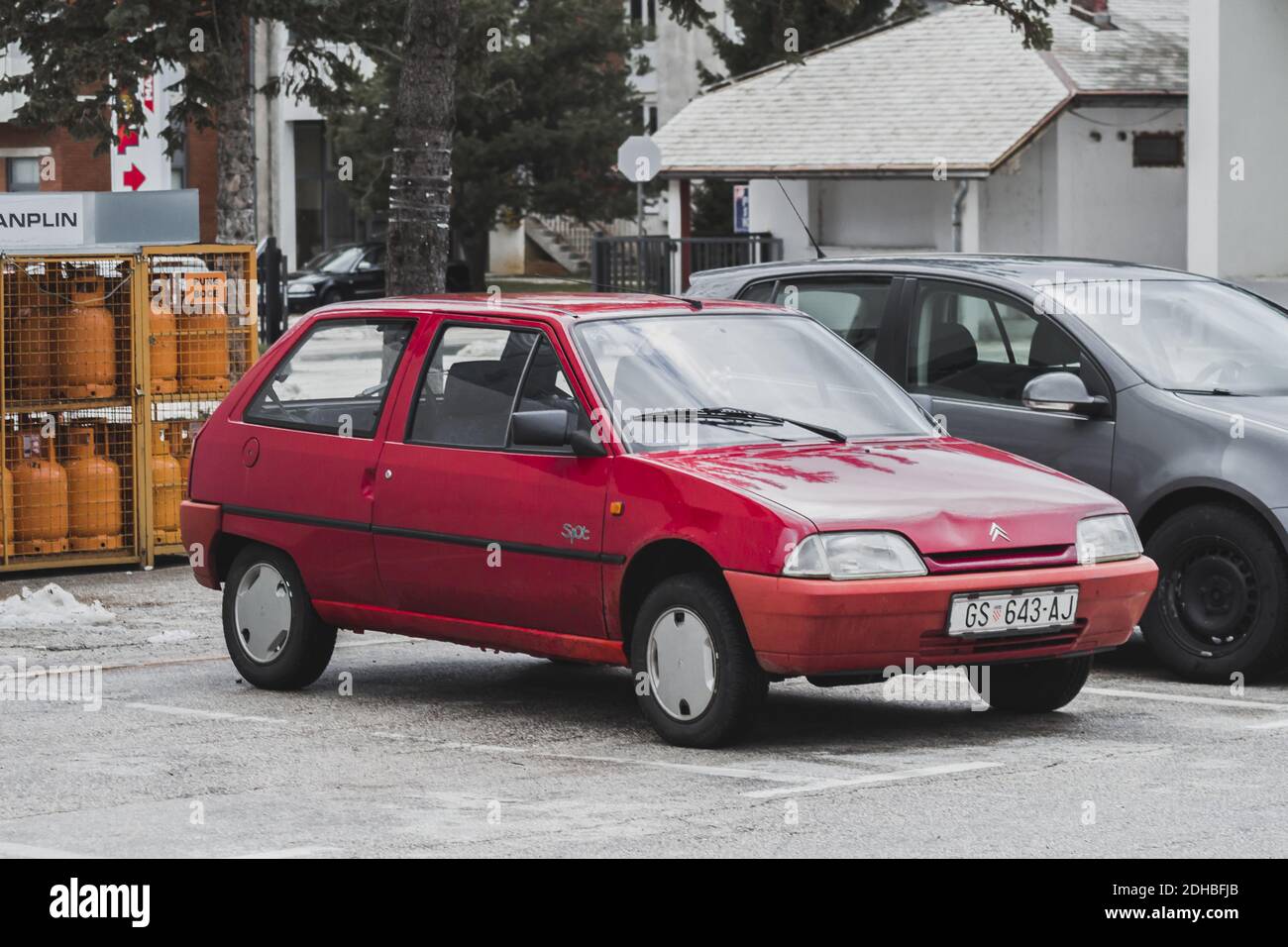 GRAčAC, CROATIA - Dec 05, 2020: Red Citroen AX, classic french compact city car from '90s and '80s Stock Photo
