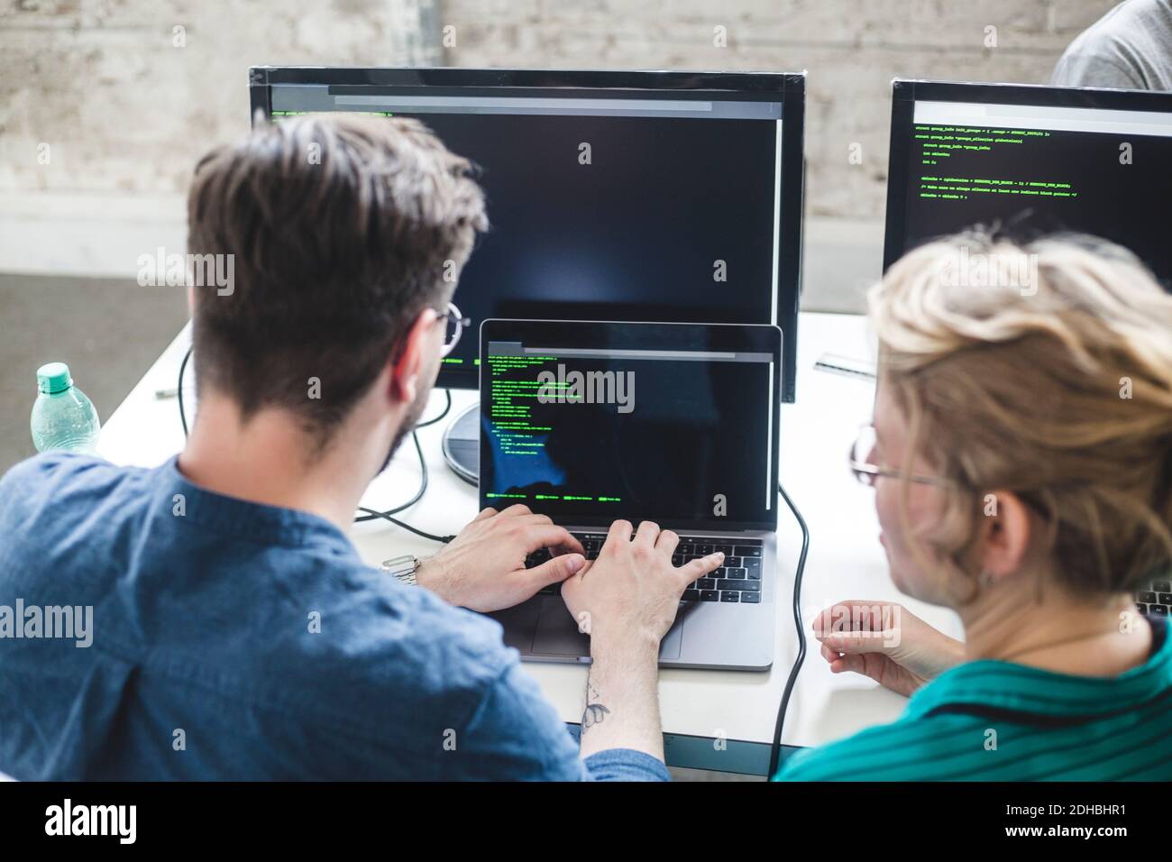 Rear view caucasian businessman using hi-res stock photography and ...