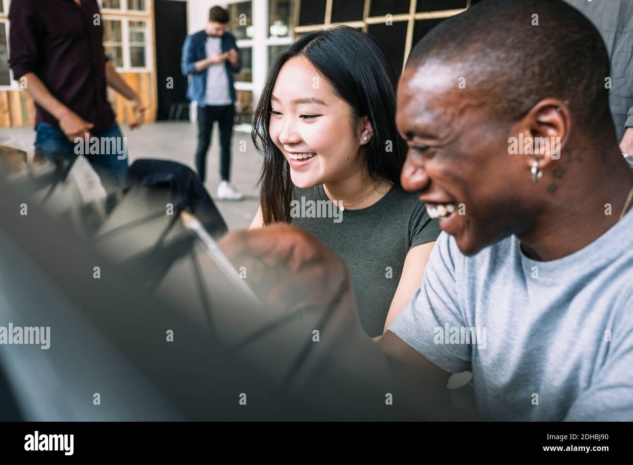 Cheerful multi-ethnic IT professionals planning at creative office Stock Photo