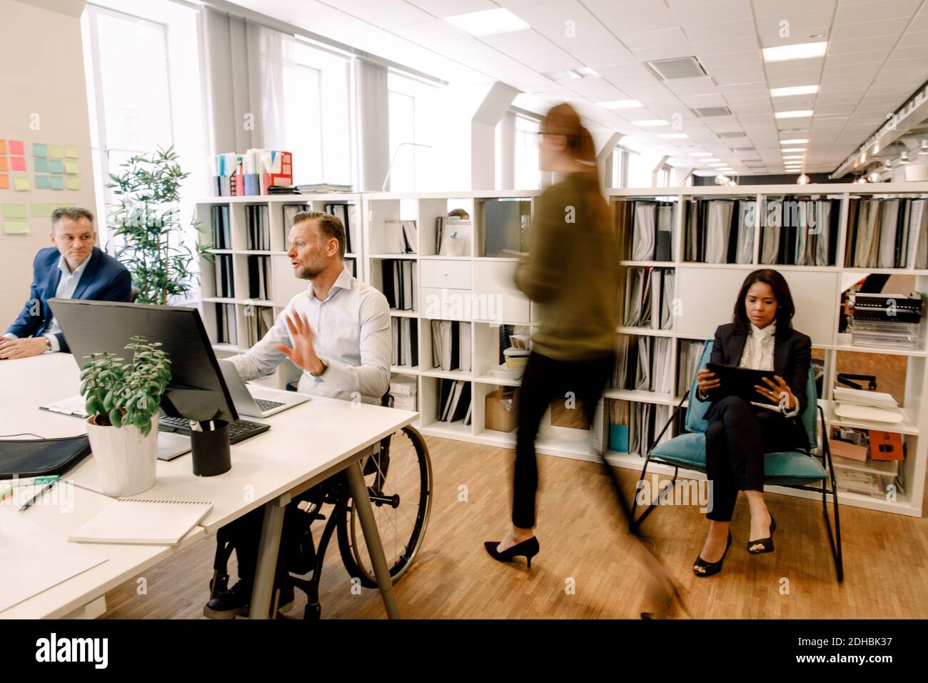 Sales professionals working in office Stock Photo