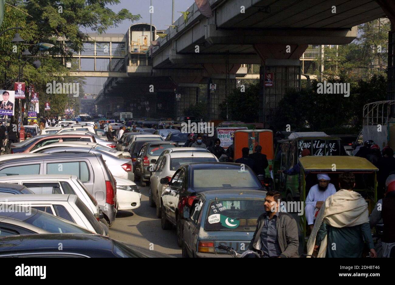 A large numbers of vehicles stuck in traffic jam due to negligence of traffic police staffs and illegal parking, at Aiwan-e-Adal road in Lahore on Thursday, December 10, 2020. Stock Photo