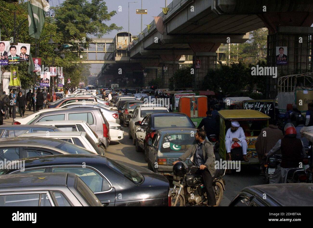 A large numbers of vehicles stuck in traffic jam due to negligence of traffic police staffs and illegal parking, at Aiwan-e-Adal road in Lahore on Thursday, December 10, 2020. Stock Photo