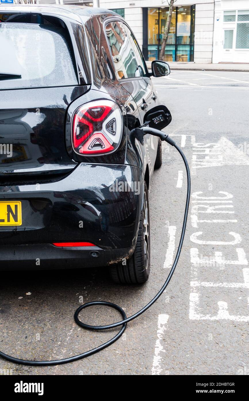 Electric car charge London in Electric Car parking point Stock Photo