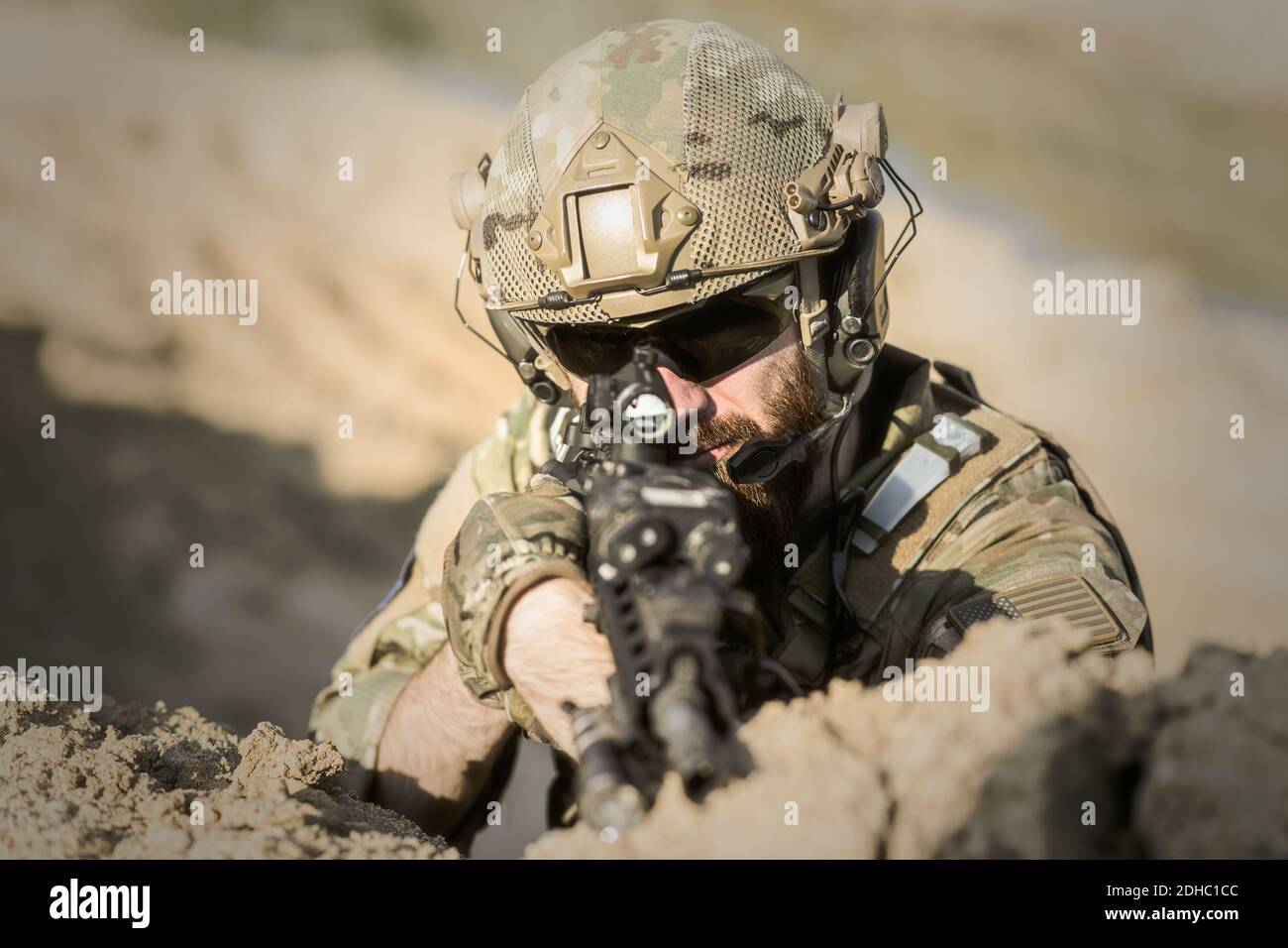 soldier pointing a gun laying down Stock Photo Alamy
