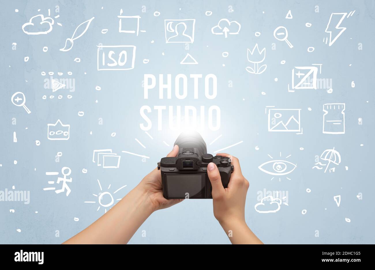 Taking Camera Program Hand taking picture with digital camera and PHOTO STUDIO inscription ...