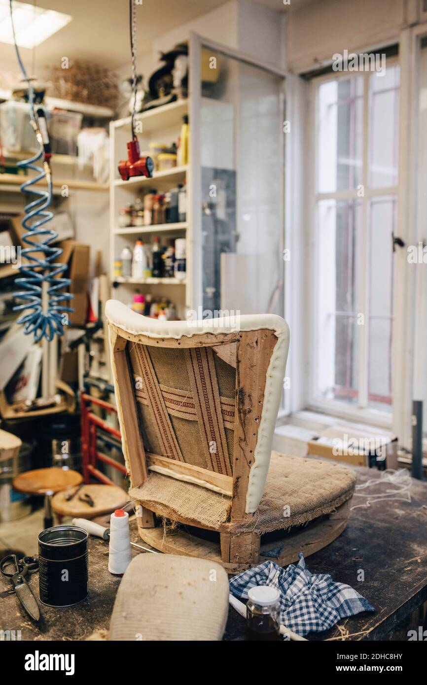 Incomplete chair in upholstery workshop Stock Photo