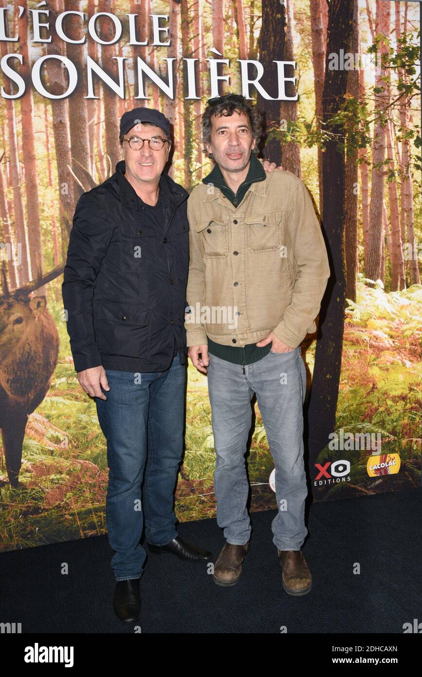 Francois Cluzet and Eric Elmosnino attending the premiere of the movie