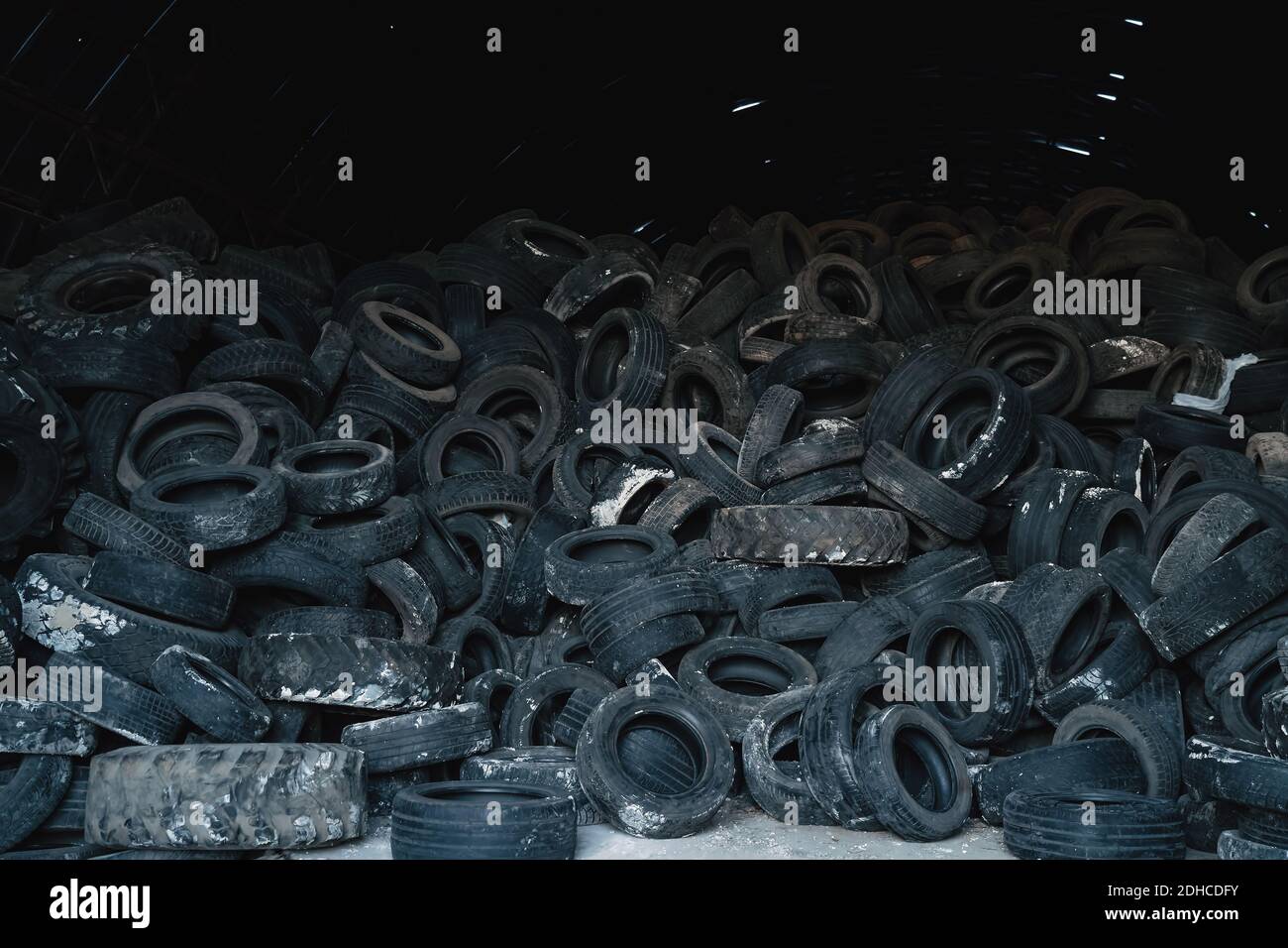 Large pile of old used car and truck tires. Stock Photo