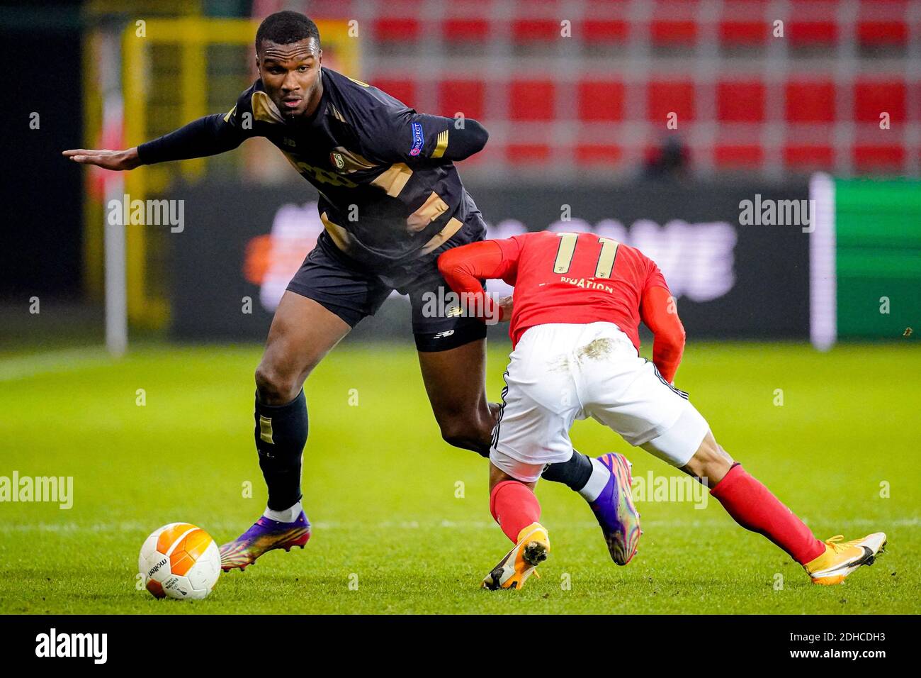 LIEGE, BELGIUM - DECEMBER 10: Obbi Oulare of Standard Liege, Franco Cervi of Benfica during the UEFA Europa League match between Standard Liege and Be Stock Photo