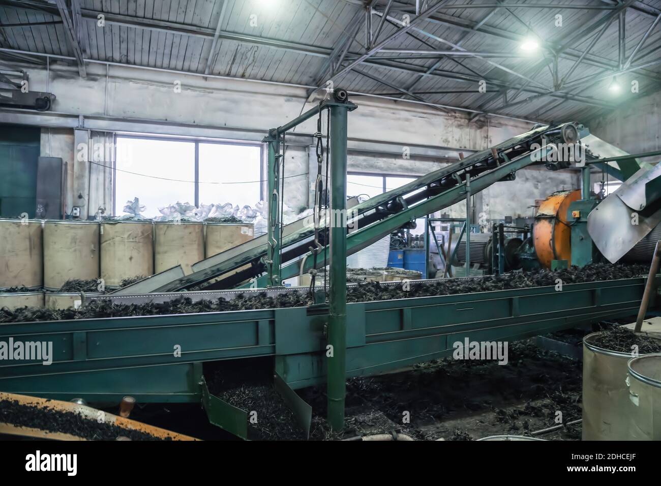 Rubber recycling processing factory, industrial equipment and conveyor
