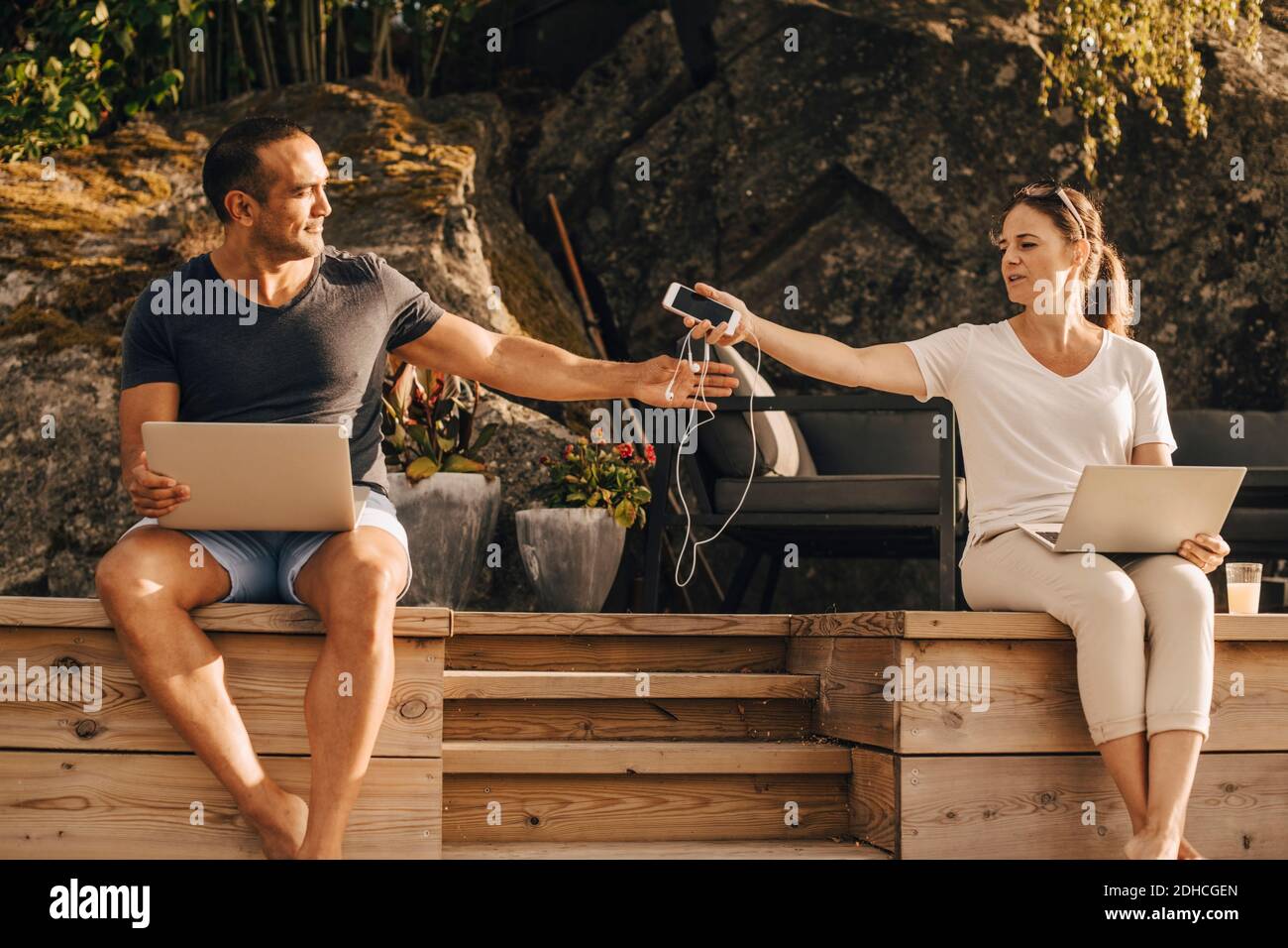 Woman sitting on man hi-res stock photography and images - Alamy