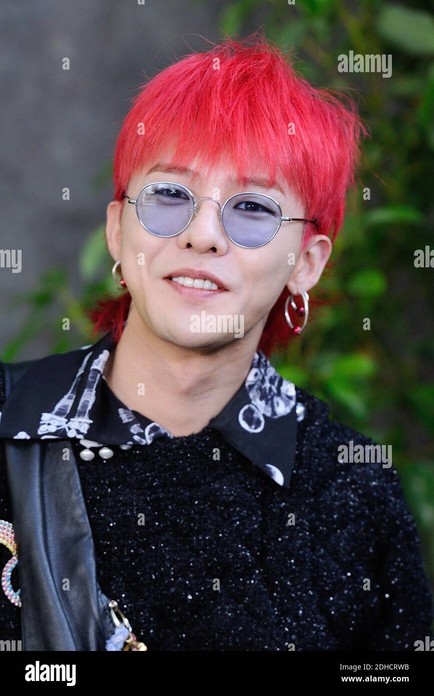 G-Dragon attending the Chanel Fashion Show as part of Paris