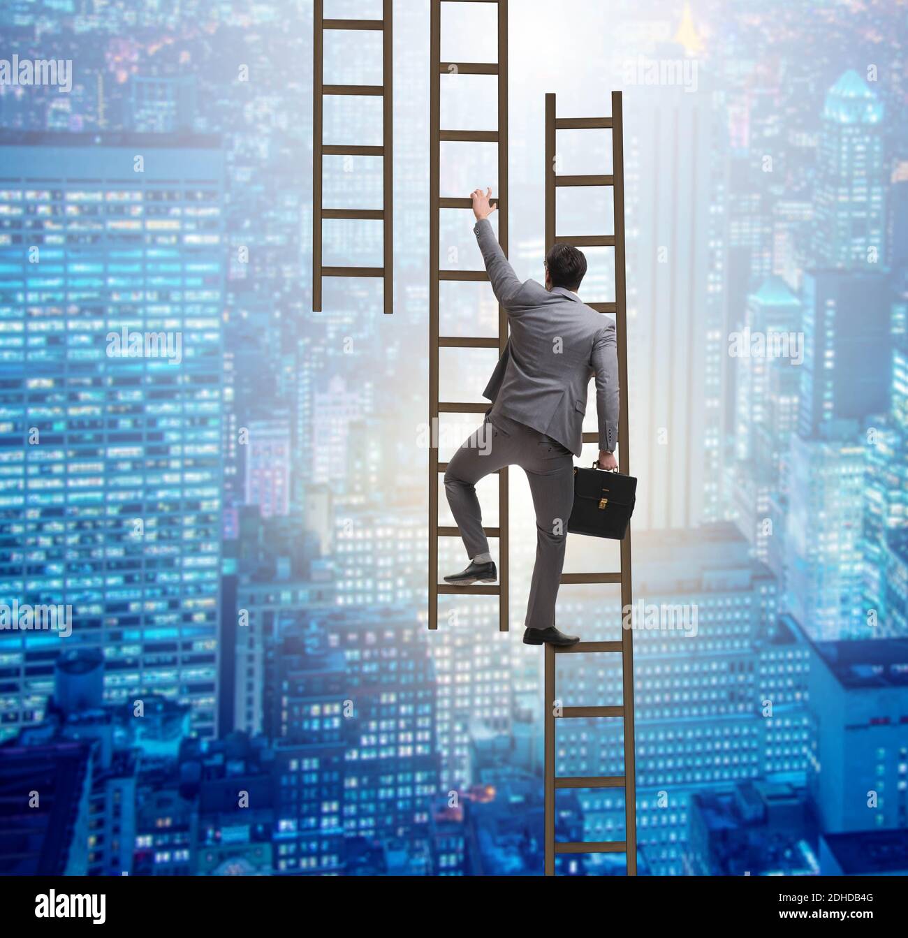 Businessman climbing career ladder in business concept Stock Photo - Alamy
