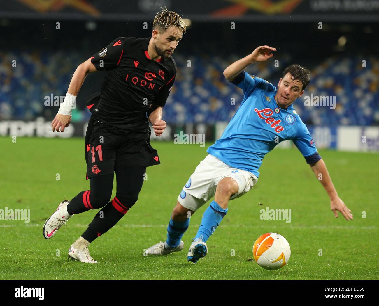 Naples, Italy. 10th Dec, 2020. Real Sociedad's Belgian midfielder Adnan Januzaj fights for the ball with Napoli's German midfielder Diego Demme during the UEFA Europa League Group F football match SSC Napoli vs Real Sociedad de Futbol. Napoli and Real Sociedad drew 1-1. Credit: Independent Photo Agency/Alamy Live News Stock Photo