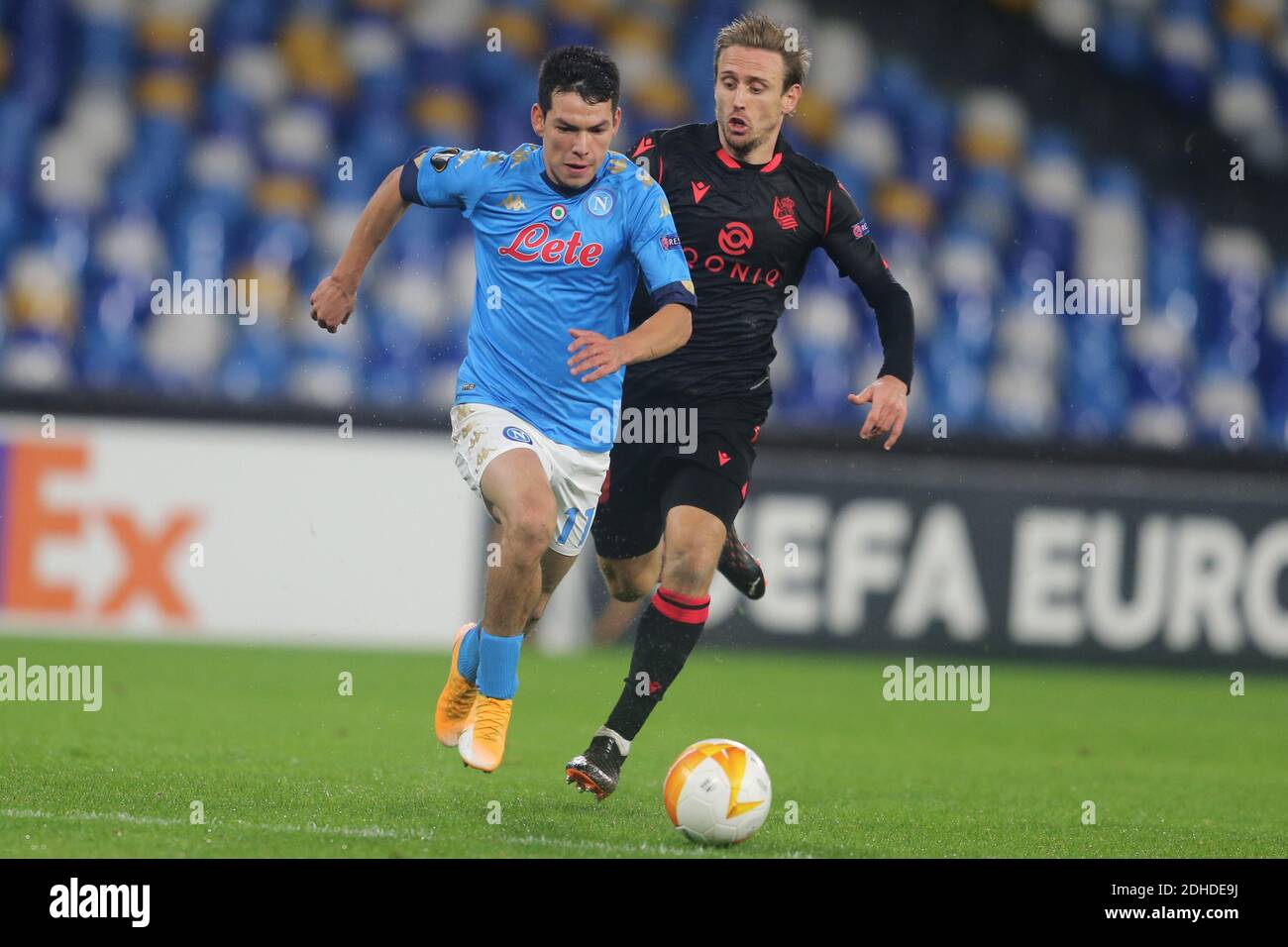 Naples, Italy. 10th Dec, 2020. SSC Napoli's Mexican striker Hirving Lozano (L) challenges for the ball with Real sociedad's Belgian striker Adnan Januzaj during the UEFA Europa League football match SSC Napoli vs Real Sociedad.Napoli and Real sociedad drew 1-1. Credit: Independent Photo Agency/Alamy Live News Stock Photo