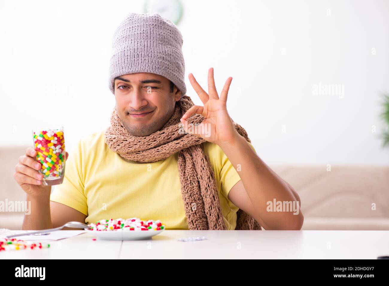 Young man suffering at home Stock Photo