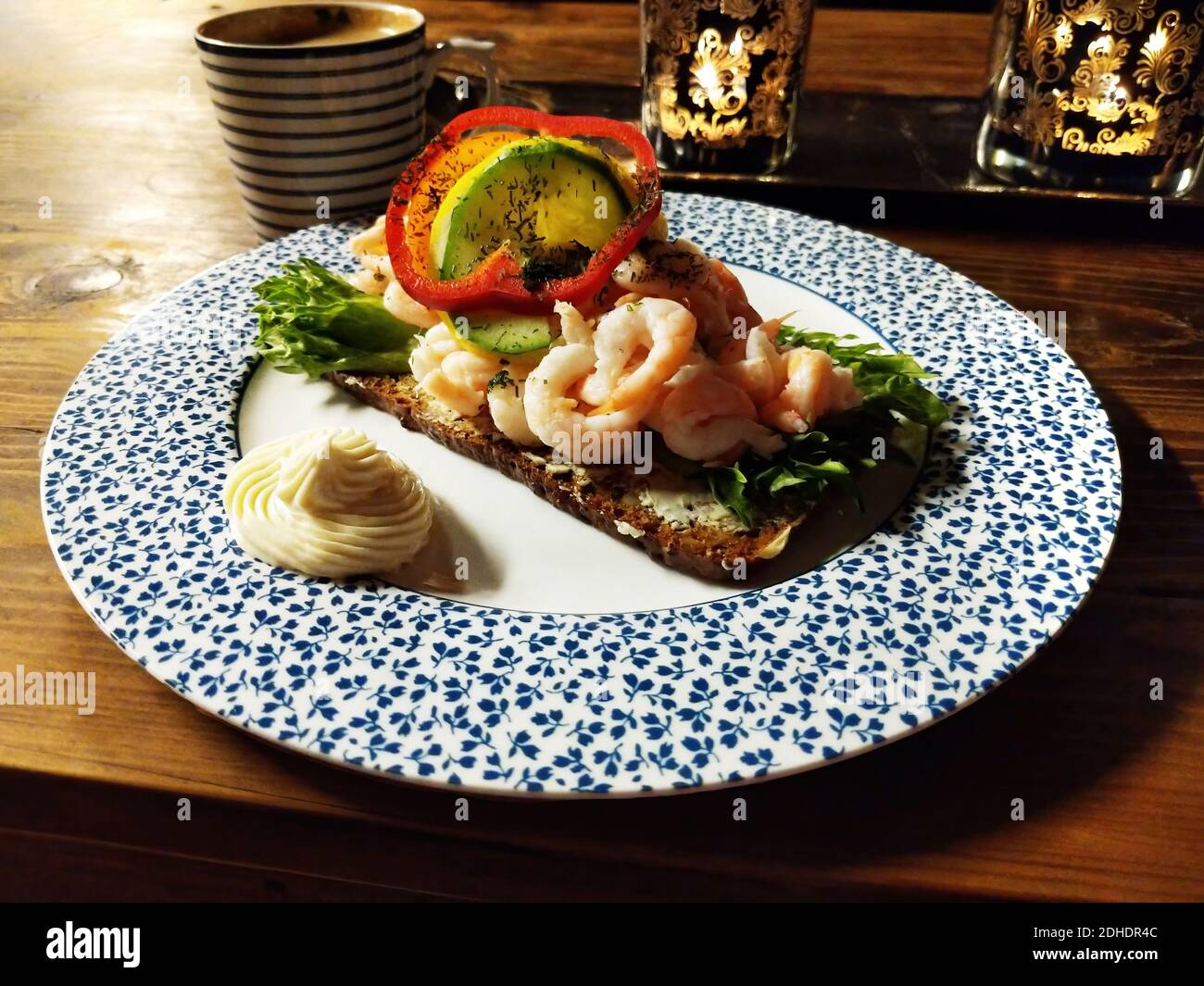 Fresh shrimp on hard bread or toast. Food photography concept. Stock Photo