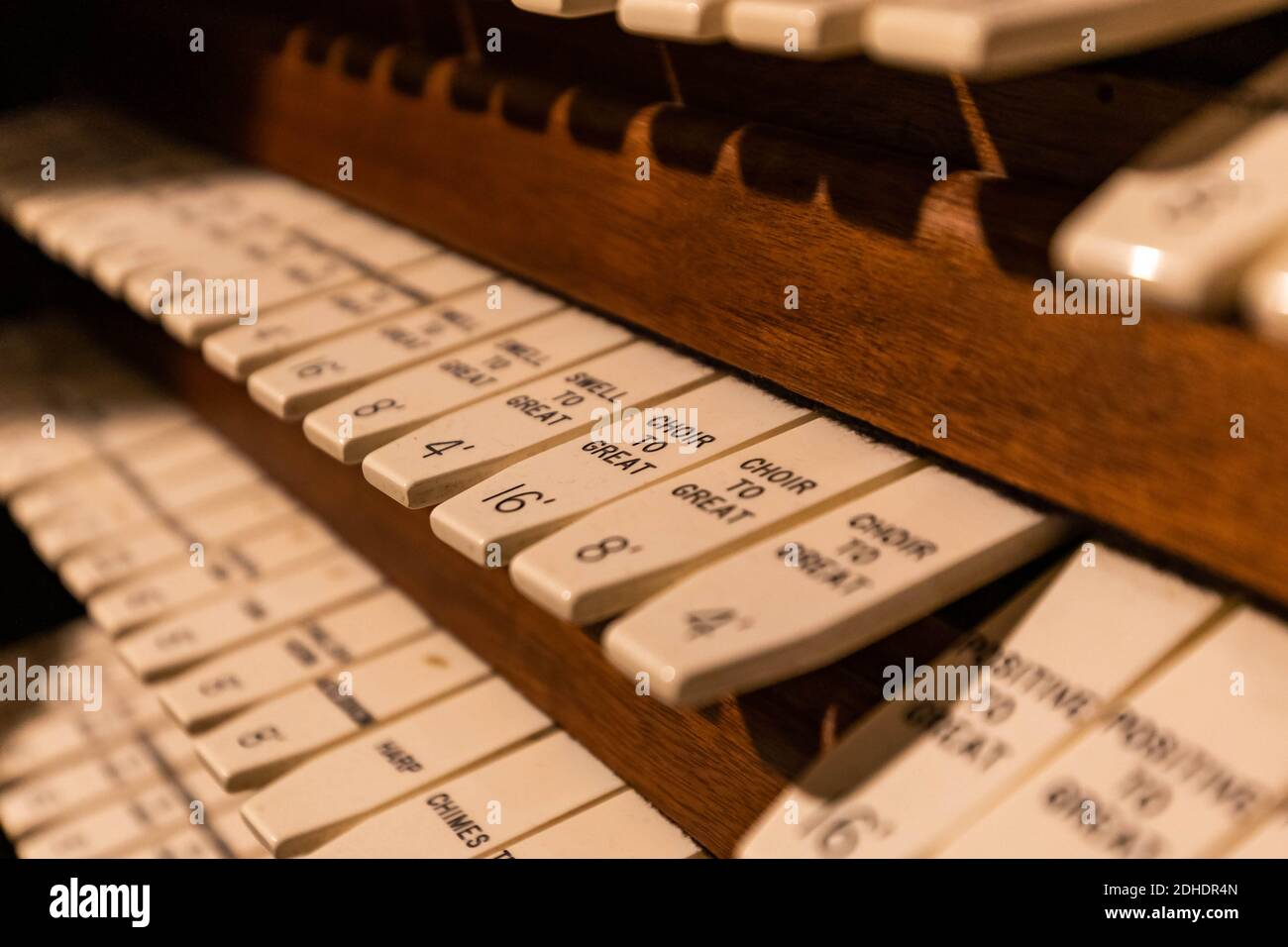 Pipe organ keyboard controls close up vintage style in english Stock Photo  - Alamy