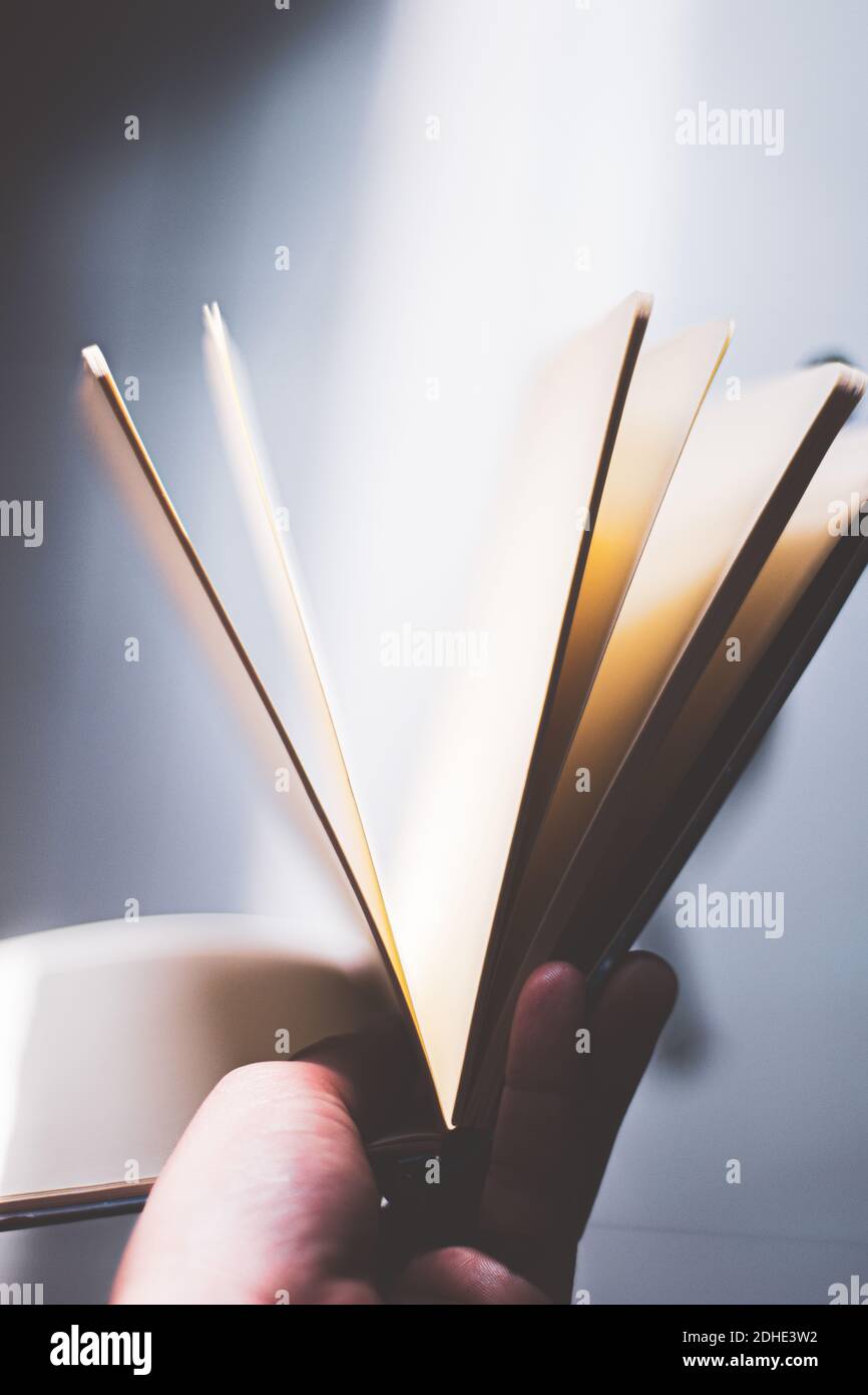 old open notebook with separate sheets Stock Photo