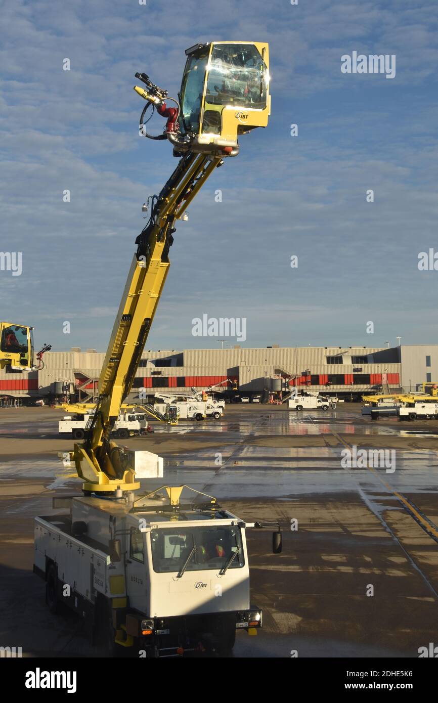 De-Icing Truck on tarmac at Atlanta airport in winter. Stock Photo