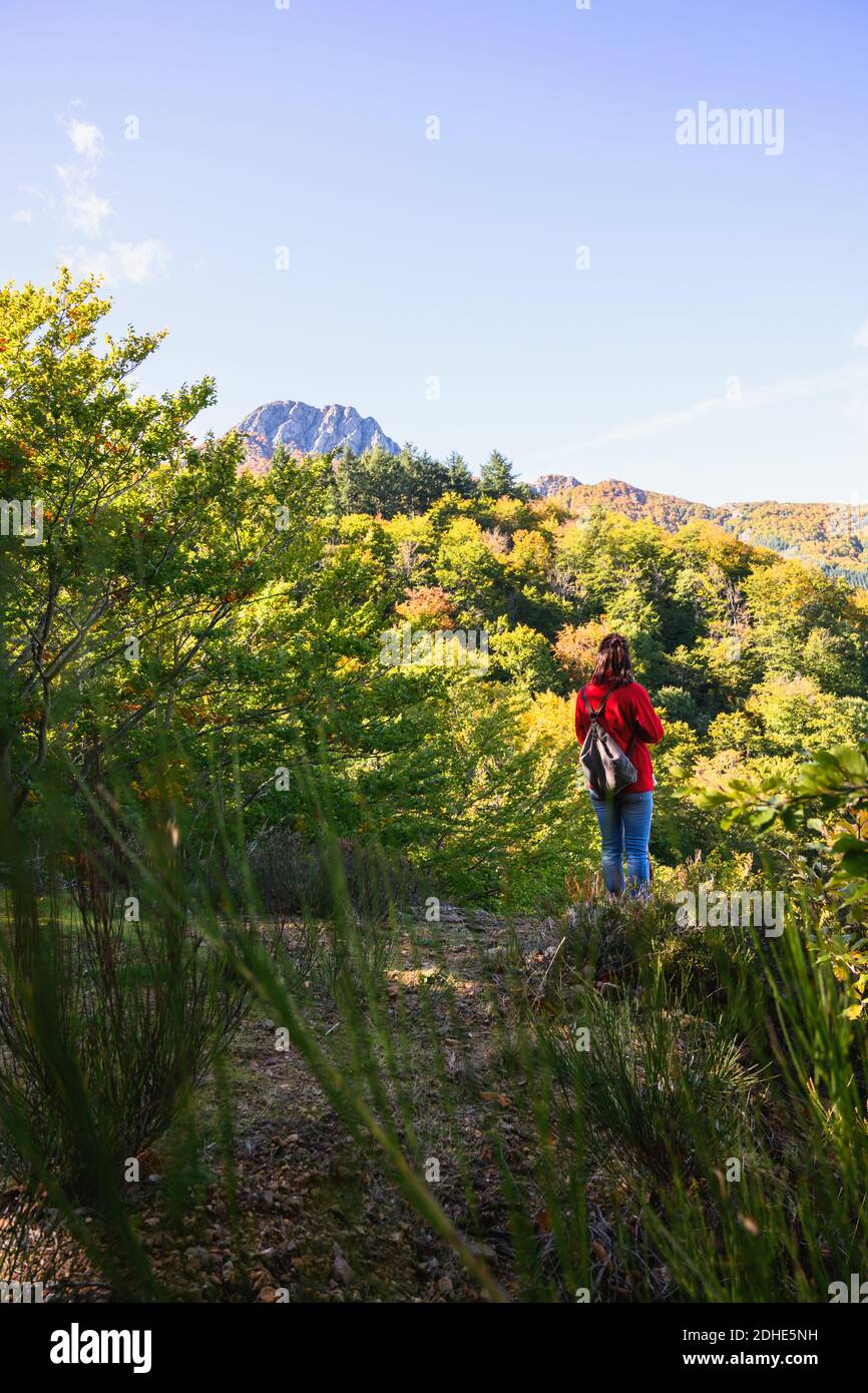 Back view lonely female hiker hi-res stock photography and images - Alamy