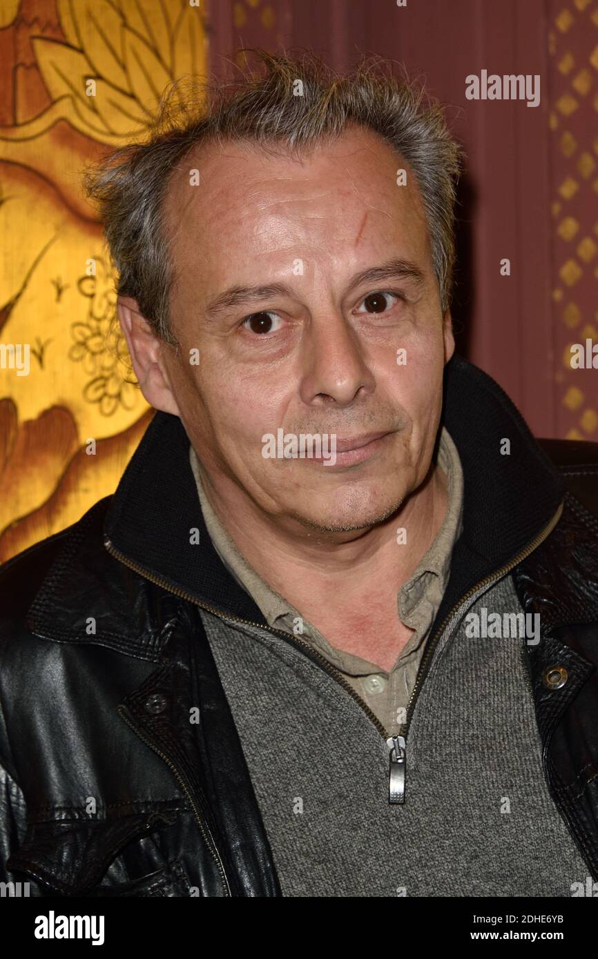 French writer Gregoire Bouillier poses after being awarded with the