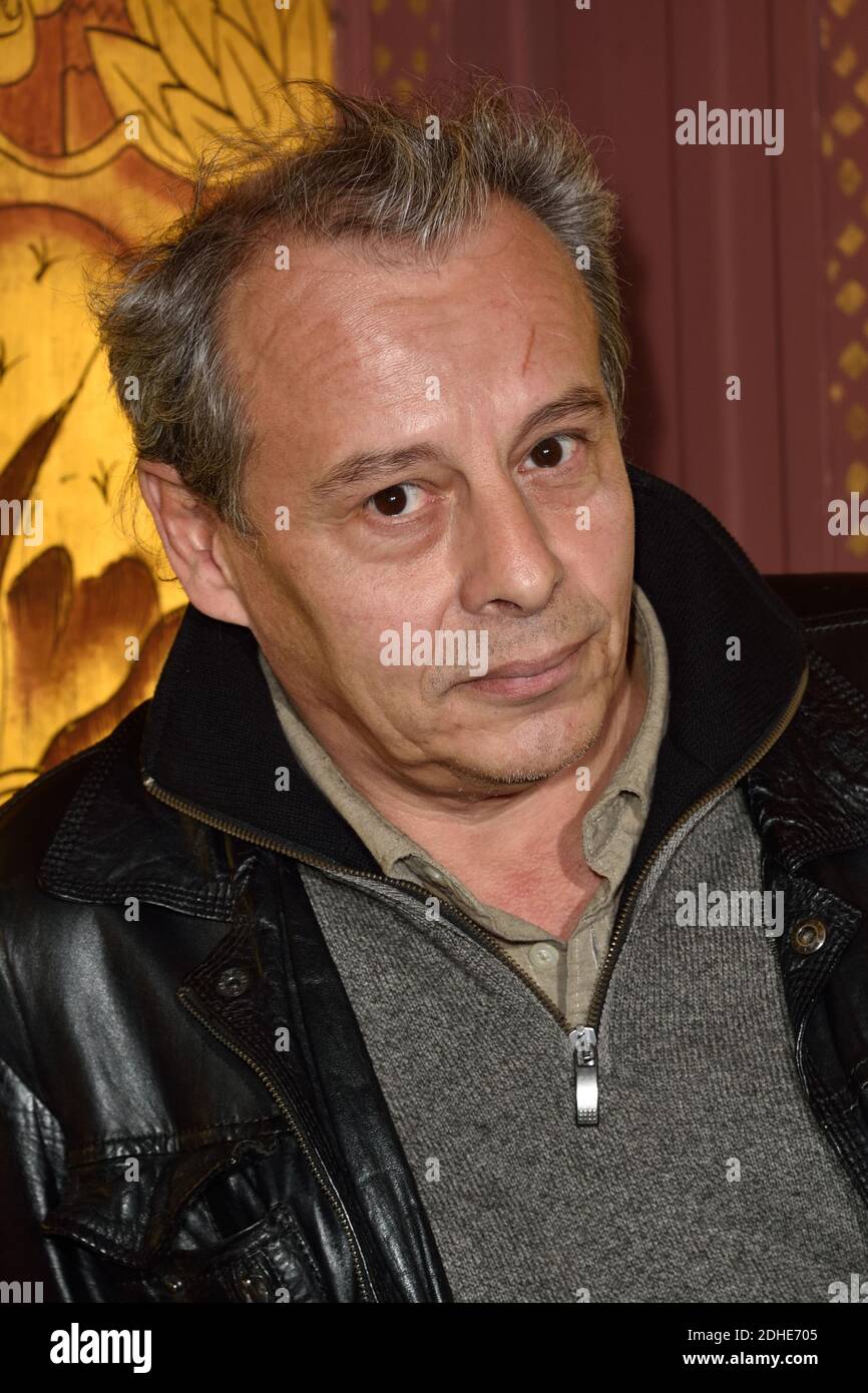 French writer Gregoire Bouillier poses after being awarded with the