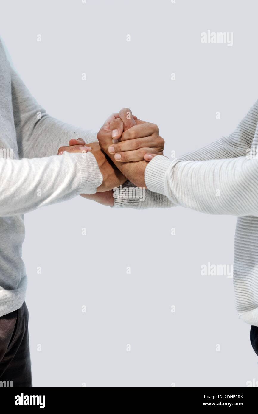 two dancing boys hold hands facing each other Stock Photo