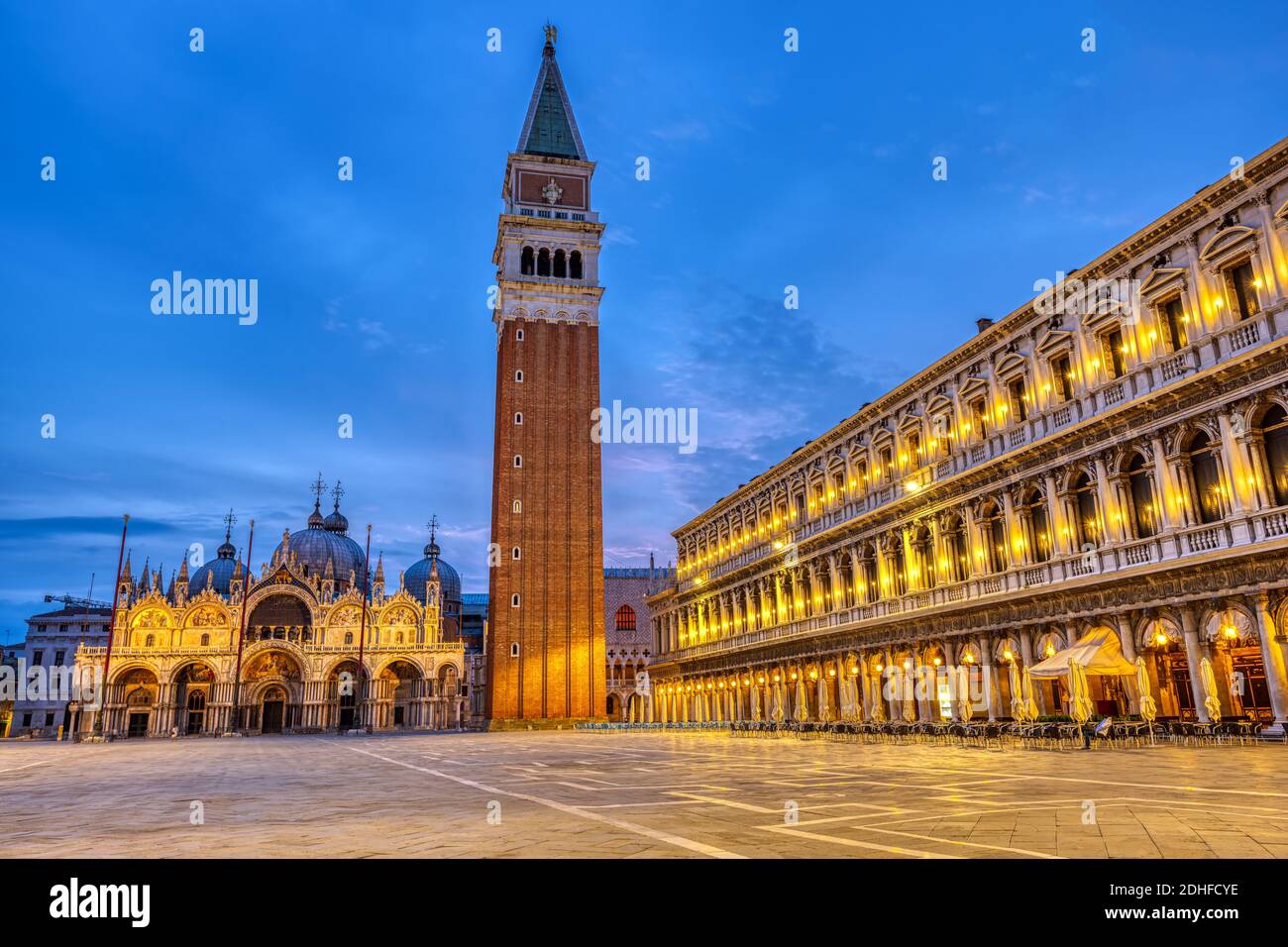 Piazza San Marco in Venice with the bell tower and the cathedral at dawn Stock Photo