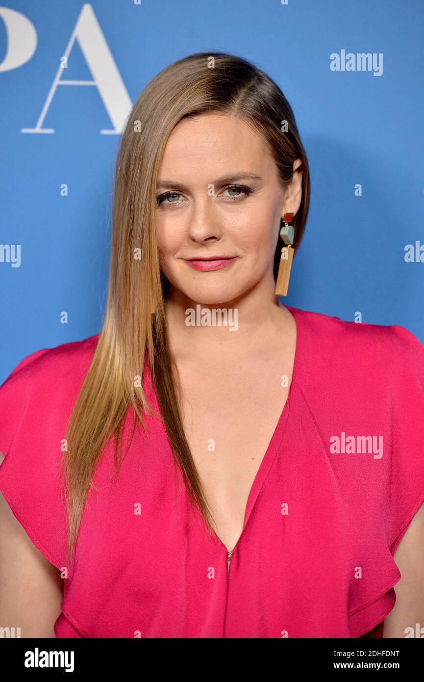 Alicia Silverstone attends the Golden Globes 75th anniversary special screening and HFPA holiday