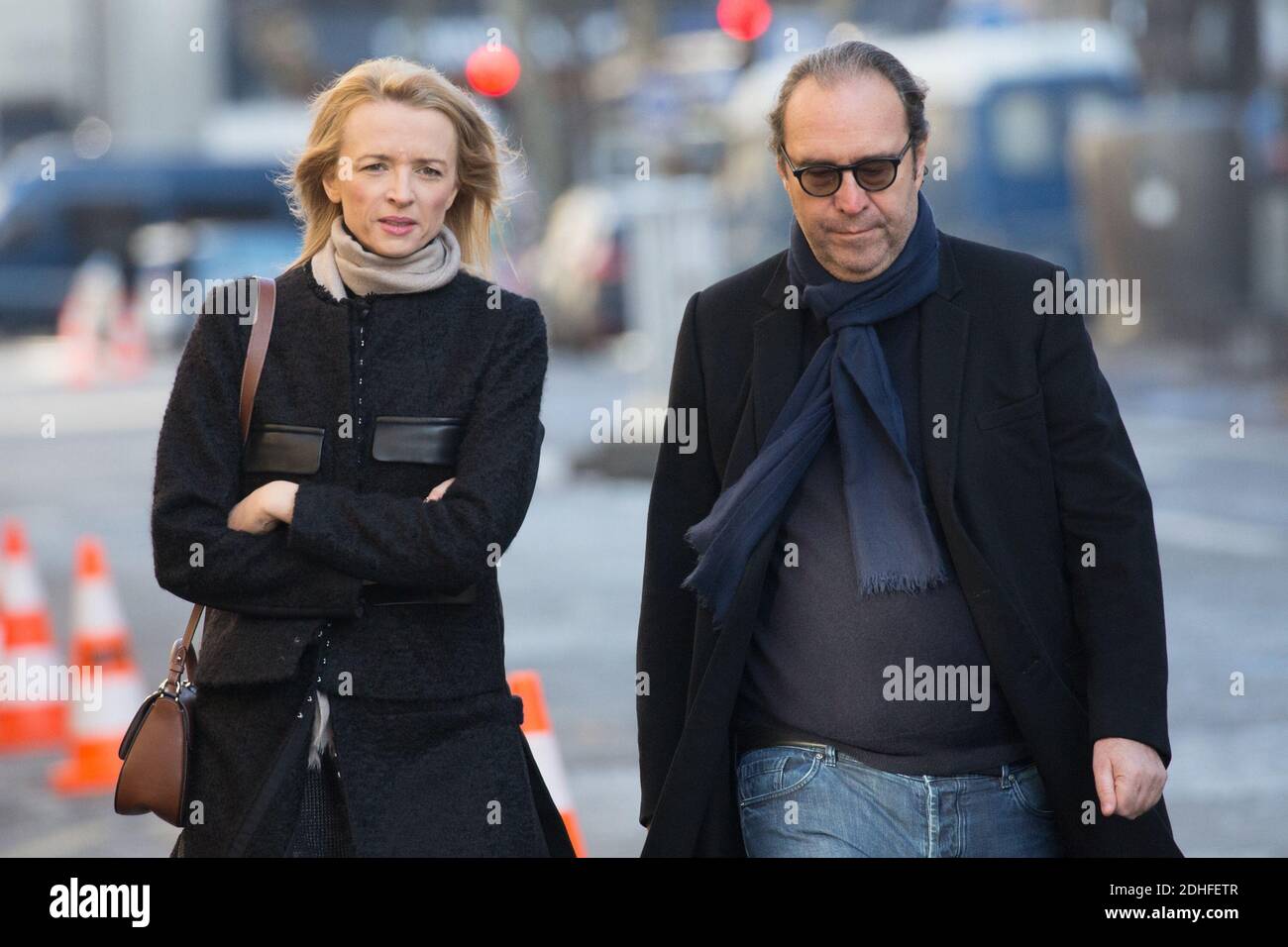 Xavier Niel and Delphine Arnault in stands during French Tennis