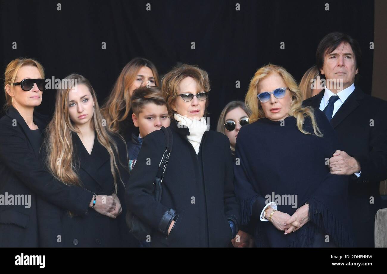 Estelle Lefebure, Emma Smet, Cameron Smet, Nathalie Baye, Sylvie Vartan and Tony Scotti arriving at the funeral ceremony organized in memory of Johnny Hallyday in Paris.The funeral convoy started from lâ€™Arc de Triomphe and then came down the Champs Elysées to Place de la Concorde before heading to the church of la Madeleine for a religious service. The President of the Republic and his wife participated in the religious service. Johnny Hallyday's musicians accompanied the funeral convoy during the procession.Photo by Christian Liewig Abacapress.com Stock Photo